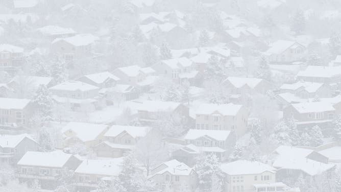 FILE - GOLDEN, CO- DECEMBER 3: Homes in a subdivision in Golden, Colorado is blanketed in new snow after winter storm dropped several inches of snow across the area on December 3, 2025. 