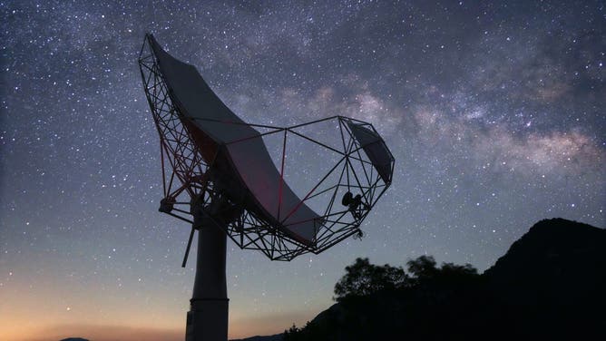 LU'AN, CHINA - MAY 10: Bright stars shine over the radio telescope of Longma Observatory Station on May 10, 2026 in Jinzhai county, Lu'an city, Anhui Province of China.
