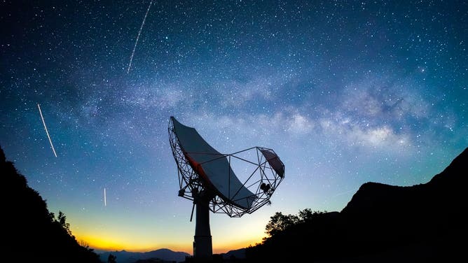 LU'AN, CHINA - MAY 10: Bright stars shine over the radio telescope of Longma Observatory Station on May 10, 2026 in Jinzhai county, Lu'an city, Anhui Province of China.