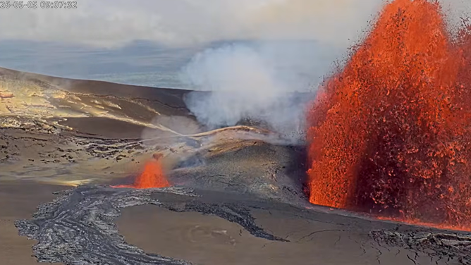 Large lava fountains shoot out of the Mount Kīlauea volcano.