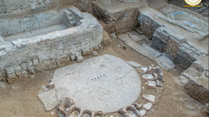 Archeologists uncover bathing basins within a Roman villa in Egypt.