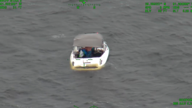 Six passengers aboard a boat in East Lakes Tohopekaliga began taking on water amid hazardous weather conditions May 2. The photo here shows the stern looking completely submerged.