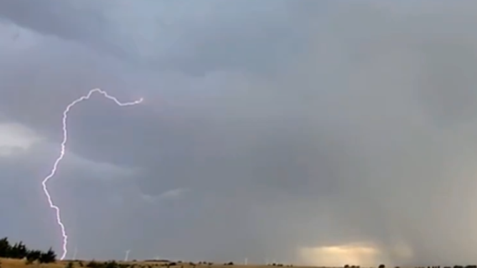 Lightning strikes Harper, Kansas, during severe thunderstorms on Thursday.