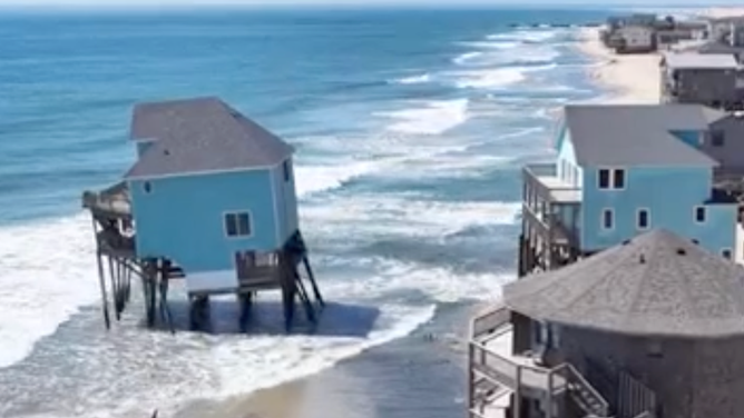 Only a few houses stand in the ocean as more and more collapses are reported down the Cape Hatteras National Seashore over the years. 