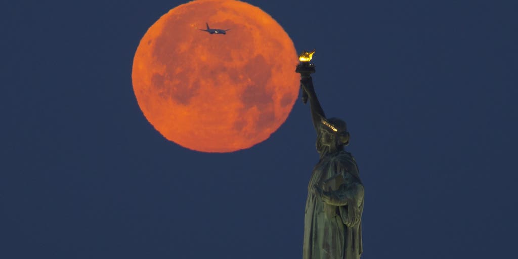 Strawberry Moon dazzles the night sky as first full moon of the summer