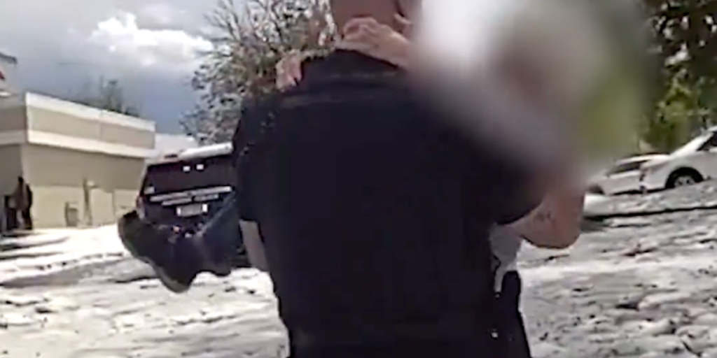 Watch: Colorado police officer rescues driver trapped in thigh-high, hail-covered floodwaters