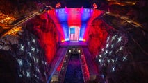 Giant American flag draped over Hoover Dam lowered until further notice due to gusty winds