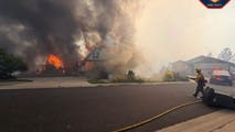 Possible human remains found after resident refused to evacuate during wildfire that destroyed 12 homes
