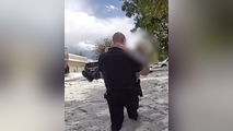 Watch: Colorado police officer rescues driver trapped in thigh-high, hail-covered floodwaters