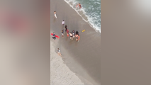 Watch: FDNY uses drone to keep struggling swimmers afloat until rescue teams arrive
