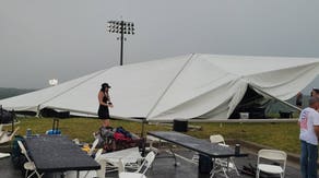 Five injured after ferocious winds and severe storms rip through college baseball game, sending tents airborne