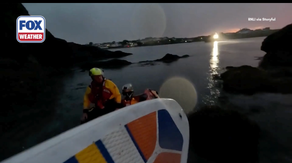 See it: Paddleboarder and dog rescued amid 'truly biblical' weather conditions