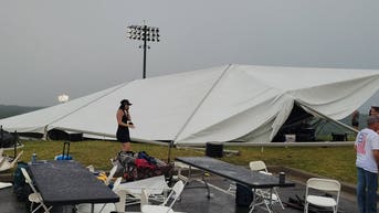 5 injured after powerful winds send tents flying through college baseball game - Fox News