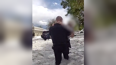 Watch: Colorado police officer rescues driver trapped in thigh-high, hail-covered floodwaters
