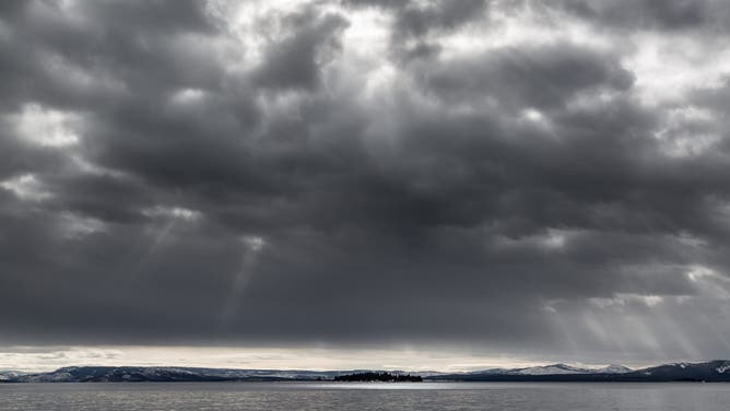 Sun shines through clouds on Yellowstone Lake