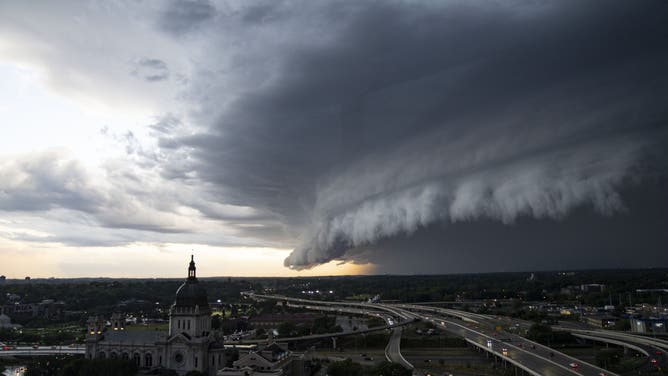 MINNEAPOLIS, MN. - JULY 2022: Storm clouds roll in Tuesday, July 12, 2022 over the Basilica of Saint Mary in Minneapolis, Minn..