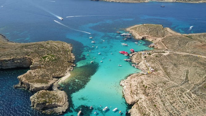 This aerial photo taken on July 7, 2023 shows a view of the island of Comino, Malta.