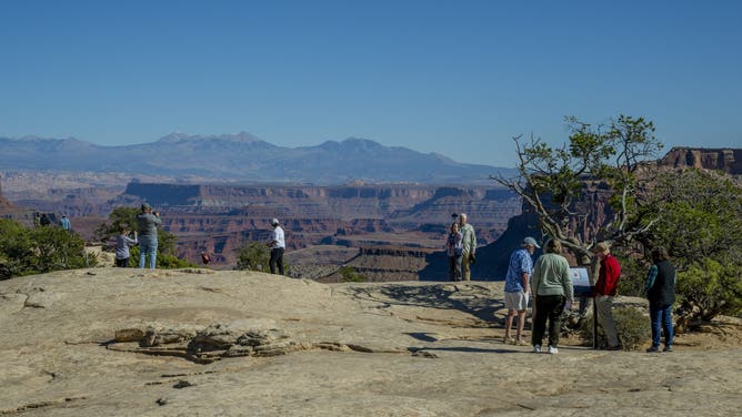 UTAH, UNITED STATES - 2025/10/18: People at the Canyonlands National Park overlook near the visitors center in Canyonlands National Park near Moab, Utah, United States.