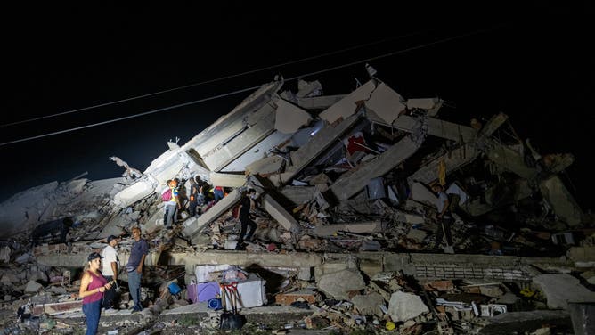 LA GUAIRA, VENEZUELA - JUNE 26:Rescue teams continue searching the rubble of collapsed buildings for survivors following the devastating earthquake in Caraballeda, La Guaira, Venezula on June 26, 2026.