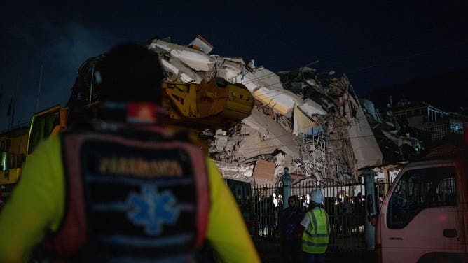 Search and rescue teams look for survivors in a collapsed hotel in La Guaira, on June 27, 2026.