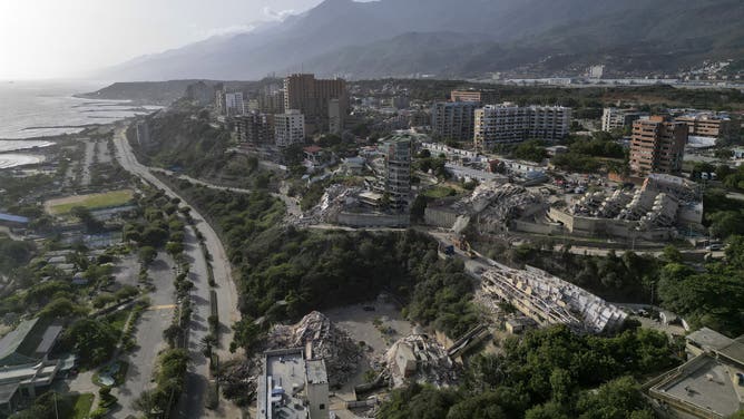 This aerial view shows collapsed buildings in Catia La Mar, La Guaira state, Venezuela, on June 27, 2026, following earthquakes that struck the region.