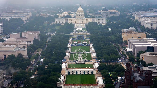 WASHINGTON, DC - JUNE 28: The U.S. Capitol building is seen the 110-foot "Freedom 250" Ferris wheel on the fourth day of the "Great American State Fair" on the National Mall as seen from the Washington Monument on June 28, 2026 in Washington, DC. The Freedom 250-backed Great American State Fair celebrating the 250th anniversary of the United States runs through July 10th. 