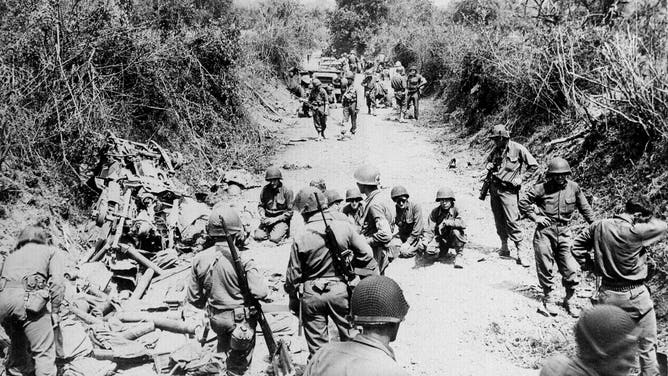 FRANCE - JUNE 01: World War II. Normandy landings. American troops stopping near Saint-Lô, July 1944.