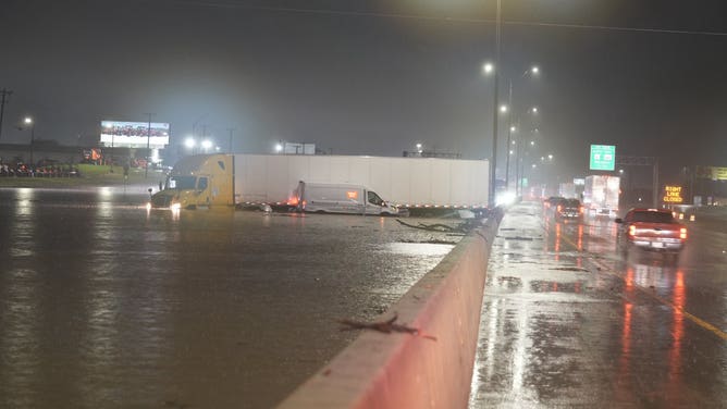 First responders rescue radical   from aggregate  vehicles stranded successful  floodwaters connected  i-35 southbound successful  Mclennan County Texas overnight.
