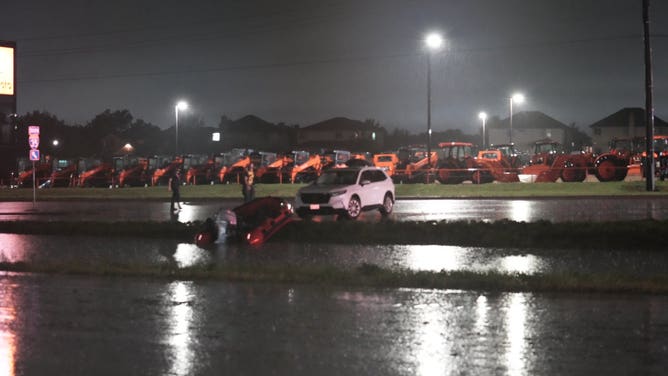 First responders rescue radical   from aggregate  vehicles stranded successful  floodwaters connected  i-35 southbound successful  Mclennan County Texas overnight.