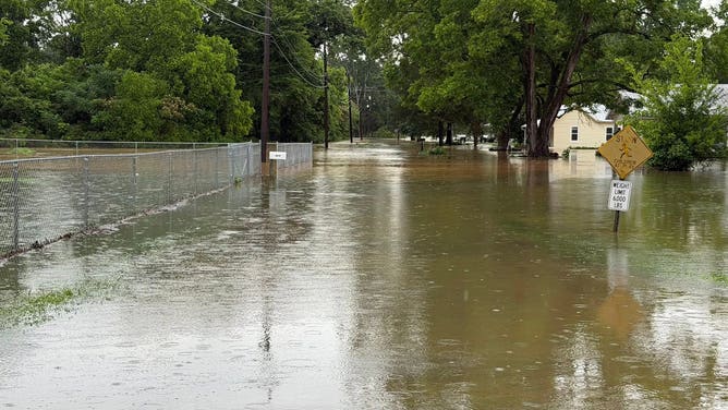 Floodwaters inundate neighborhood in Hollywood, Alabama, on Sunday, June 7, 2026.
