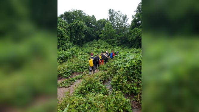 Rescuers saved 14 people from flooded caves during two separate incidents in northern Alabama during a Flash Flood Emergency in Jackson County Sunday afternoon.