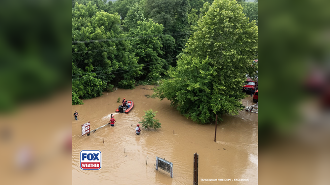 15 campers become stranded after fast-rising floodwaters overtake the area.