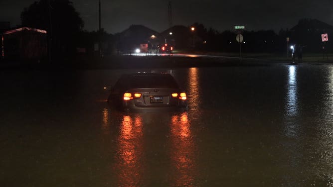 First responders rescue radical   from aggregate  vehicles stranded successful  floodwaters connected  i-35 southbound successful  Mclennan County Texas overnight.