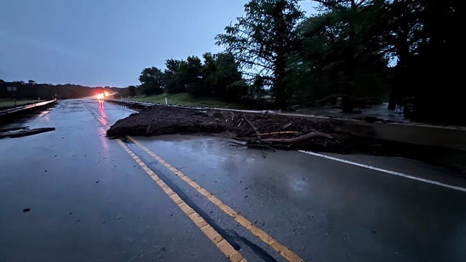 Texas flooding causes important    harm  to the roadway successful  the Sisterdale country  connected  Monday.