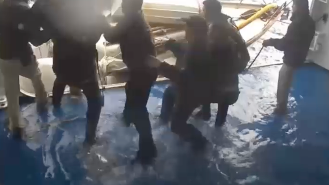 Crews from the Silver Whisper pull the distressed mariner onto the cruise ship nearly 500 miles off the Oregon coast.
