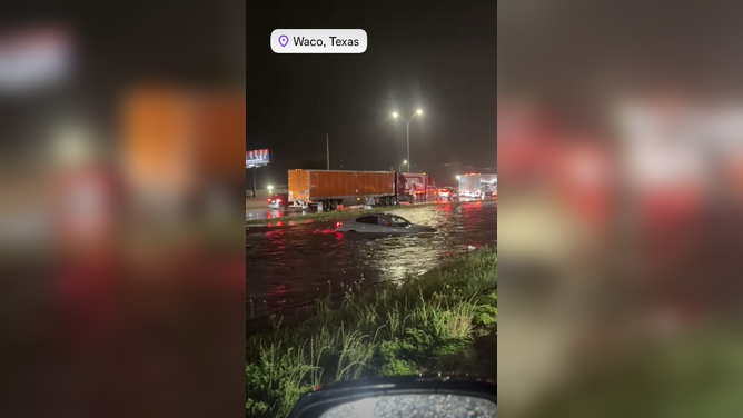 Vehicle floats down   I-35 during flooding successful  Waco, Texas, Monday June 15.