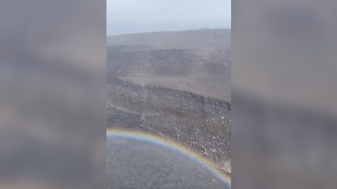 A rainbow is seen as Hawaii’s Kīlauea volcano nears 50th episode
