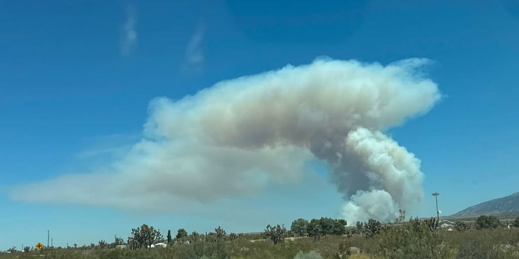 Urgent evacuations ordered as California wildfire erupts, threatening structures