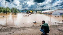 2 dead in West Virginia after catastrophic flooding slammed the state, triggering state of emergency