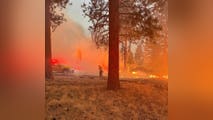 Lightning-sparked wildfires rage across Oregon and Washington after mid-July severe storms