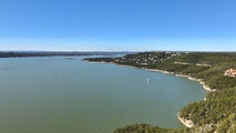 Lake Travis passes capacity after devastating Texas floods, threatening homes as Bertha moves along Gulf