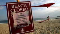 Bacteria warnings hit popular beaches across the US as millions gear up for summer holidays