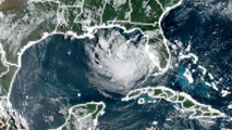 Invest 91L declared in the Gulf, with heavy downpours expected in Florida