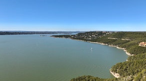 Lake Travis passes capacity after devastating Texas floods, threatening homes as Bertha moves along Gulf