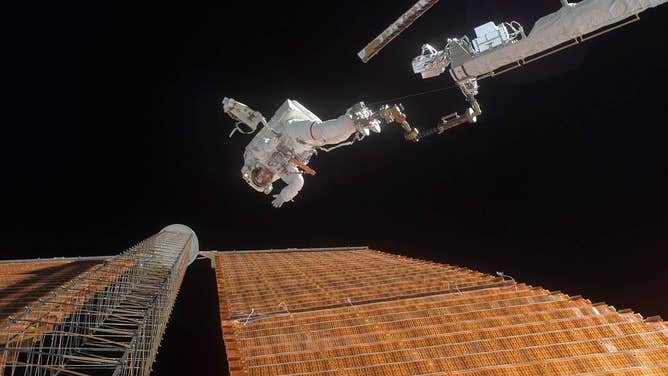 Astronaut Scott Parazynski performing repairs on the ISS.