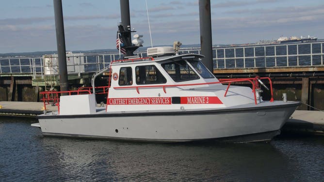 A Carteret Fire Department marine vessel was returning from a routine regional security detail when it was struck by a breaching whale on July 4.