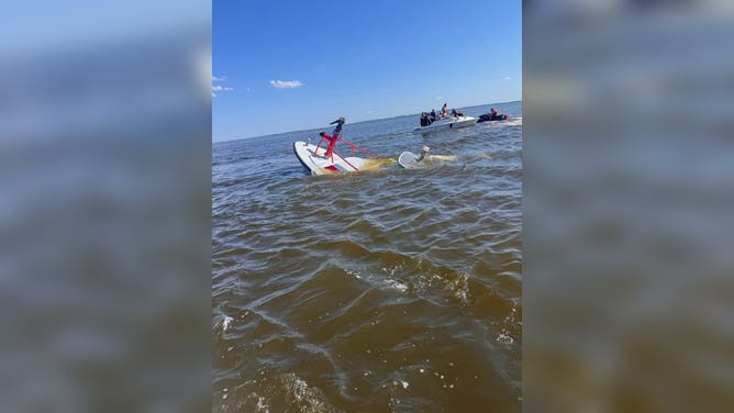 A Carteret Fire Department marine vessel suffered catastrophic damage when it was struck by a surfacing whale on July 4, sinking so rapidly that firefighters aboard had only seconds to abandon ship.