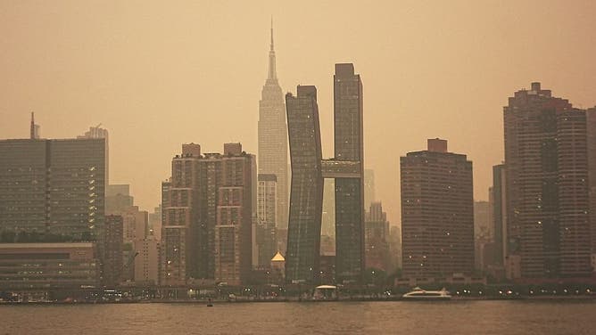 NEW YORK CITY, UNITED STATES - JULY 15: Smoke from wildfires in Canada is causing poor air quality across New York City on Wednesday and could make it harder to breathe, especially for people with asthma or other health conditions, July 15, 2026, New York City, U.S.