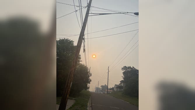 Wildfire smoke over Ironwood, Michigan, on July 15, 2026.