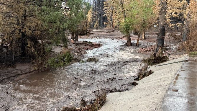 Pueblo County Flash Flood Emergency due to debris flow from Aspen Acres Fire on July 28, 2026.